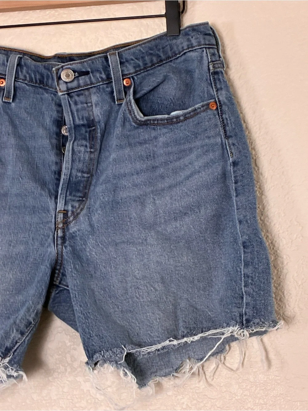 Levi’s | 501 button fly raw hem cut off long jean shorts bermuda denim size 32